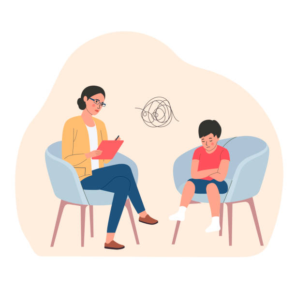 Child counselor working with young client