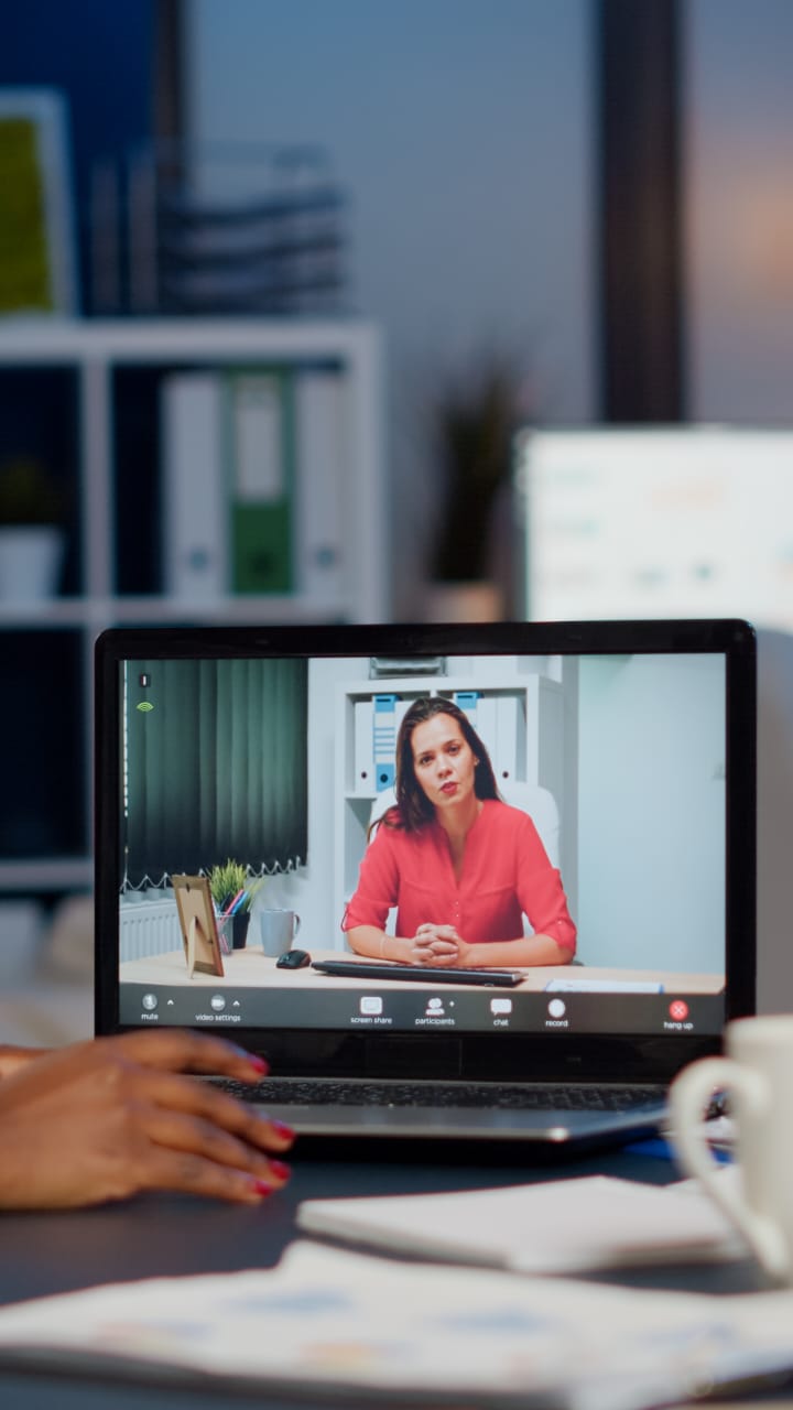 Family participating in online therapy session