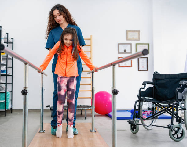 Physical therapist working with child