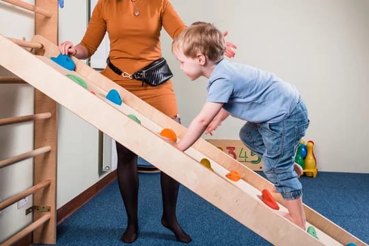 Children in physical therapy group session