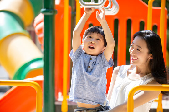 Child using sensory swing equipment